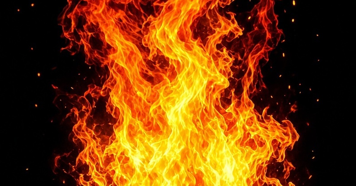 Close-up of bright orange flames against black background, symbolizing fresh fire and spiritual renewal